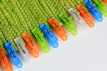 clothespins on green rug
