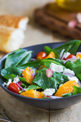 Orange with spinach, pomegranate and feta cheese salad