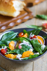 Orange with spinach, pomegranate and feta cheese salad