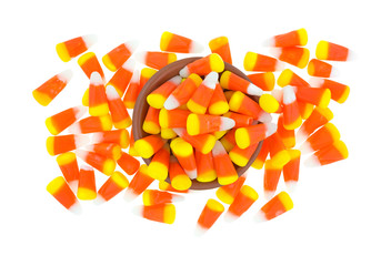 Halloween candy corn mess with a bowl in the middle