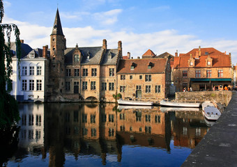 Fototapeta na wymiar Tower on the river in Belgium
