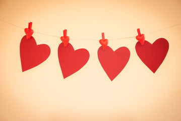 Paper hearts hanging on a rope, with vignette