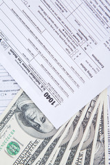 Closeup of money cash and tax form