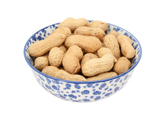 Monkey nuts in a blue and white china bowl