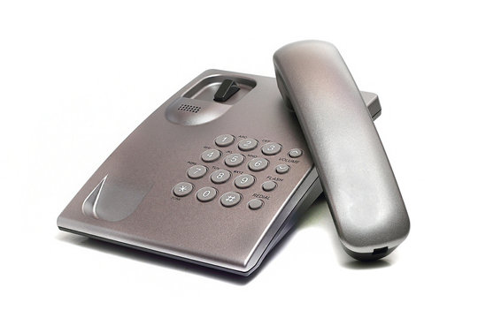 Landline Phone Of Gray On A White Background