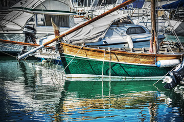 Fototapeta na wymiar wooden boat in Alghero harbor in hdr