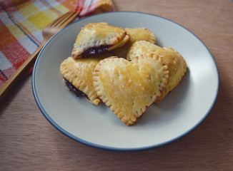 Homemade Raspberries, lemon crust hearts on a plate