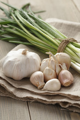 bunch of fresh organic green onions and garlic