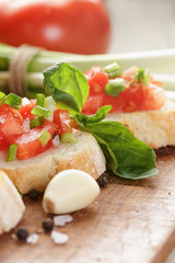 simple italian bruschetta with tomato and chives