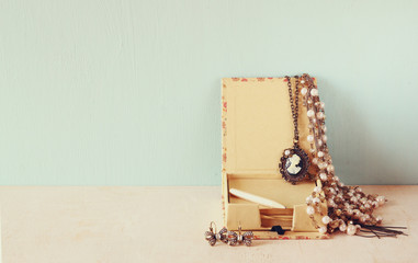 A collection of romantic vintage jewelry. retro filtered image