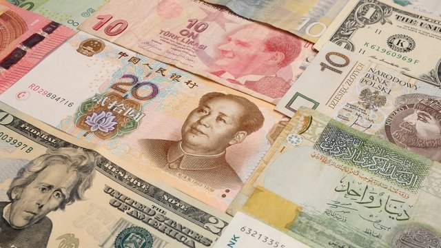 Various currency notes background. Dollar, Euro, Yuan, Lira, Kun