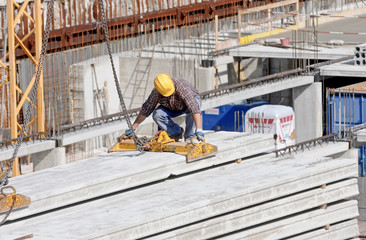 Naklejka na ściany i meble Worker in construction site