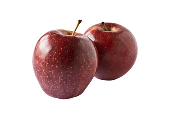 Two red apples on a white background