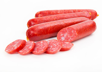 Smoked sausages isolated on white background
