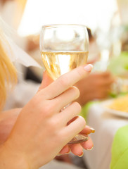 Holiday Event people cheering with champagne and wine