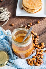 Peanut Butter and Fresh peanut butter on wooden background