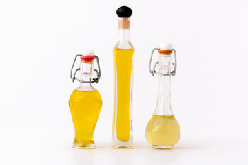 three bottles of olive oil