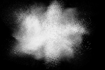 Freeze motion of white powder exploding shatter splatter