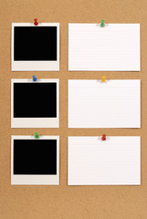 Row or line of polaroid style photo frame print with office index card pinned to a cork notice or bulletin board