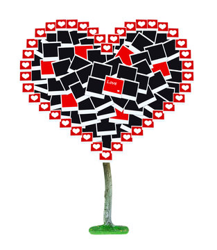 Big heart-shaped tree made of photo cards isolated on white