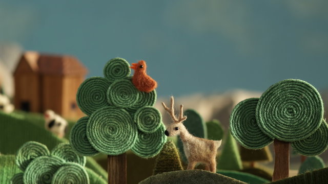 Countryside - alpine landscape with animals made of wool