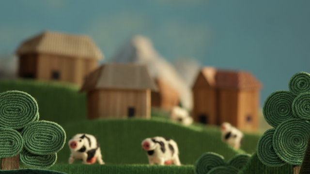 Countryside landscape with cows, farms and meadows - animation