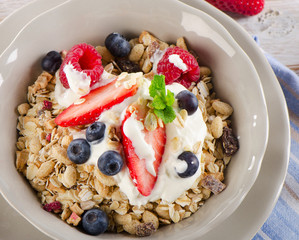 Healthy Breakfast - fresh berries, yogurt and  muesli.
