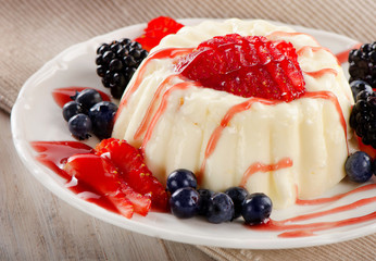 Delicious  dessert with fresh berries .