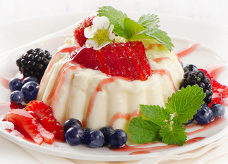 Delicious sweet dessert with fresh berries .