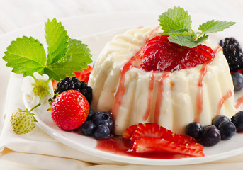 Delicious sweet dessert with  berries .