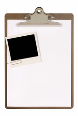 Clipboard or clip board with polaroid style photo print frame and white paper
