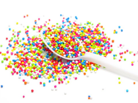 Colorful Sugar Pearls In White Spoon