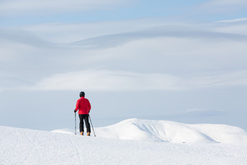 Fototapeta na wymiar Man walking on ski in mountain