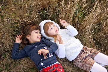 Portrait of two girls in the woods girlfriends