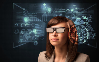 Young woman looking with futuristic smart high tech glasses