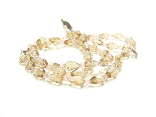 twisted strands of white pearls on a white background