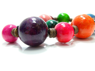close up colorful wood bead necklace