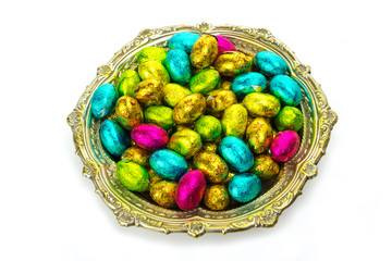 Easter chocolate eggs on white background