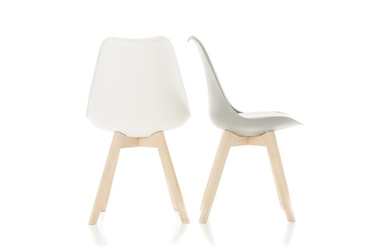 Empty Wooden Leg Chairs Isolated on White
