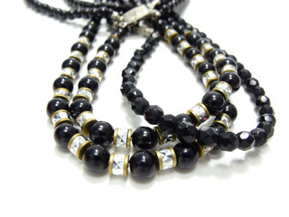 close up of black and silver crystal bead