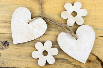 wooden hearts as photoframe at wooden background