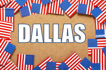 Fototapeta na wymiar The title Dallas with a border of USA Flags