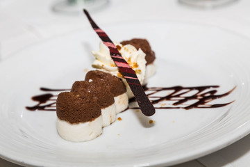 Vanilla and Chocolate Pastries on Plate