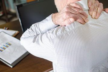 Businessman with neck pain