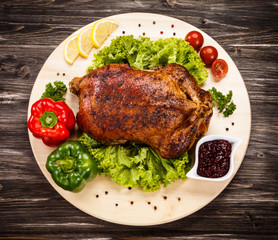 Roast duck on cutting board