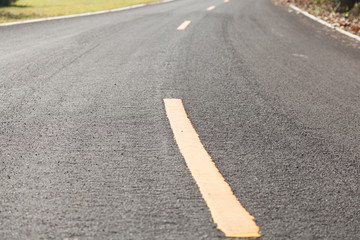 yellow curve on the road.
