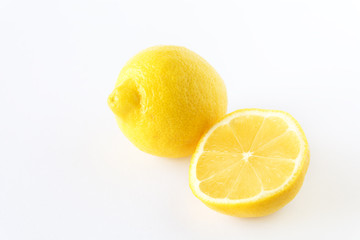 One and a half lemon on a white background