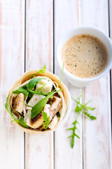 wrap roll with chicken, rocket and cheese