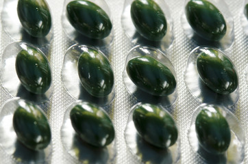 tablet in green packaging