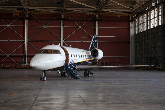 Business Jet Airplane Stays In Hangar.